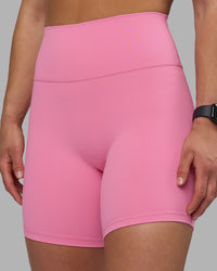 Woman wearing Fusion Ultra High-Rise 6" Short - Candy Pink | Model:Keisha | Size:S
