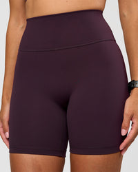 Woman wearing Fusion Ultra High-Rise 6" Short - Midnight Plum | Set:true | Angle:closeup | Model:Rhiley | Size:S