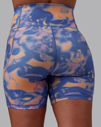 Woman wearing Fusion Ultra High-Rise 6" Short Pockets - Apricot Mist | Model:Charlize | Size:S