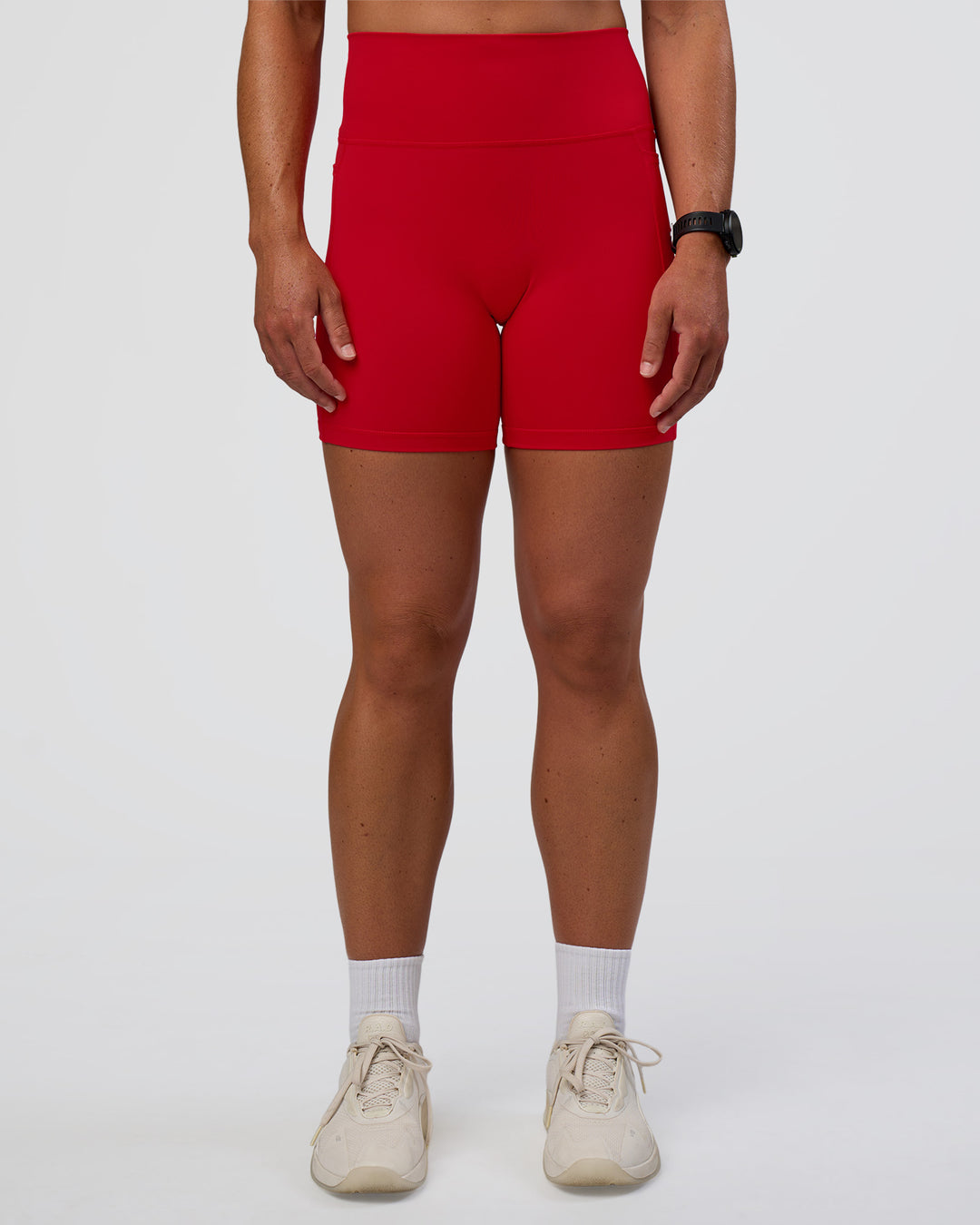 Woman wearing Fusion Ultra High-Rise 6&quot; Short Pockets - Flame | Model:Sav | Size:S