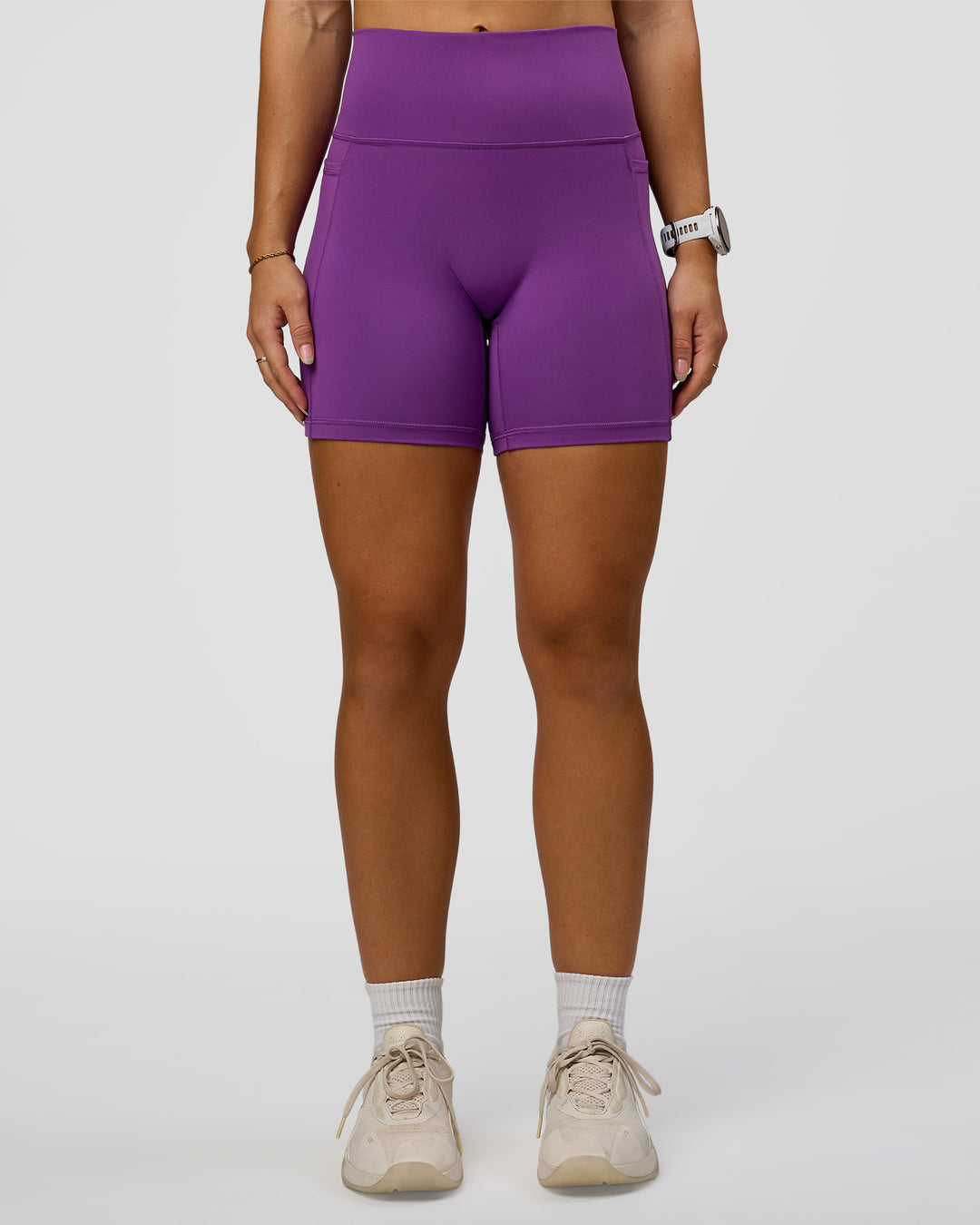 Woman wearing Fusion Ultra High-Rise 6" Short Pockets - Fresh Purple | Set:true | Angle:front | Model:Summer | Size:S