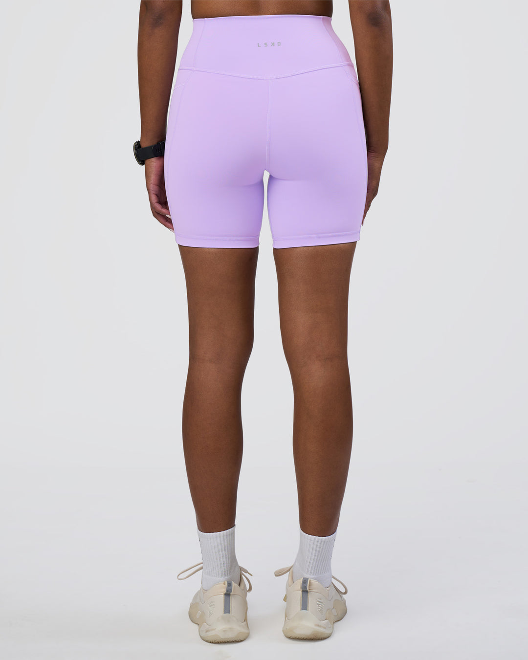 Woman wearing Fusion Ultra High-Rise 6&quot; Short Pockets - Pale Lilac | Model:Rica | Size:S
