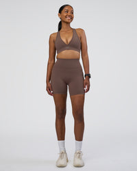 Woman wearing Fusion Ultra High-Rise 6" Short Pockets - Peppercorn | Model:Rica | Size:S