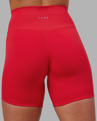 Woman wearing Fusion Ultra High-Rise 6" Short - Scarlet | Model:Keisha | Size:S