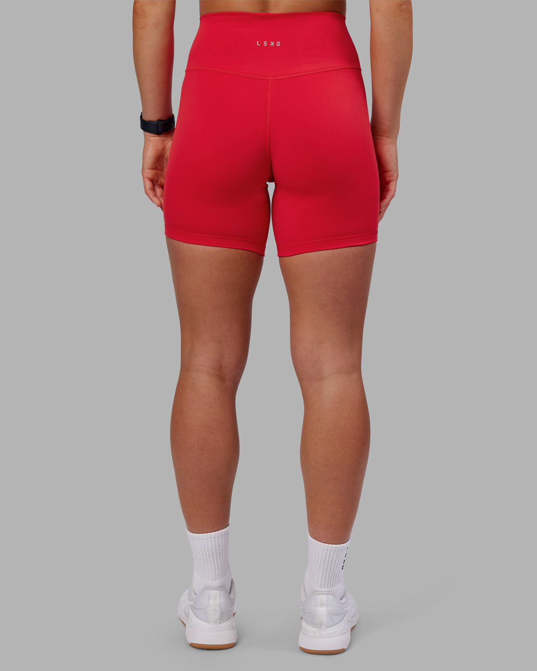 Woman wearing Fusion Ultra High-Rise 6&quot; Short - Scarlet | Model:Keisha | Size:S