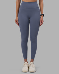 Woman wearing Fusion Ultra High-Rise 7/8 Legging - Night Shadow | Model:Rhiley | Size:S