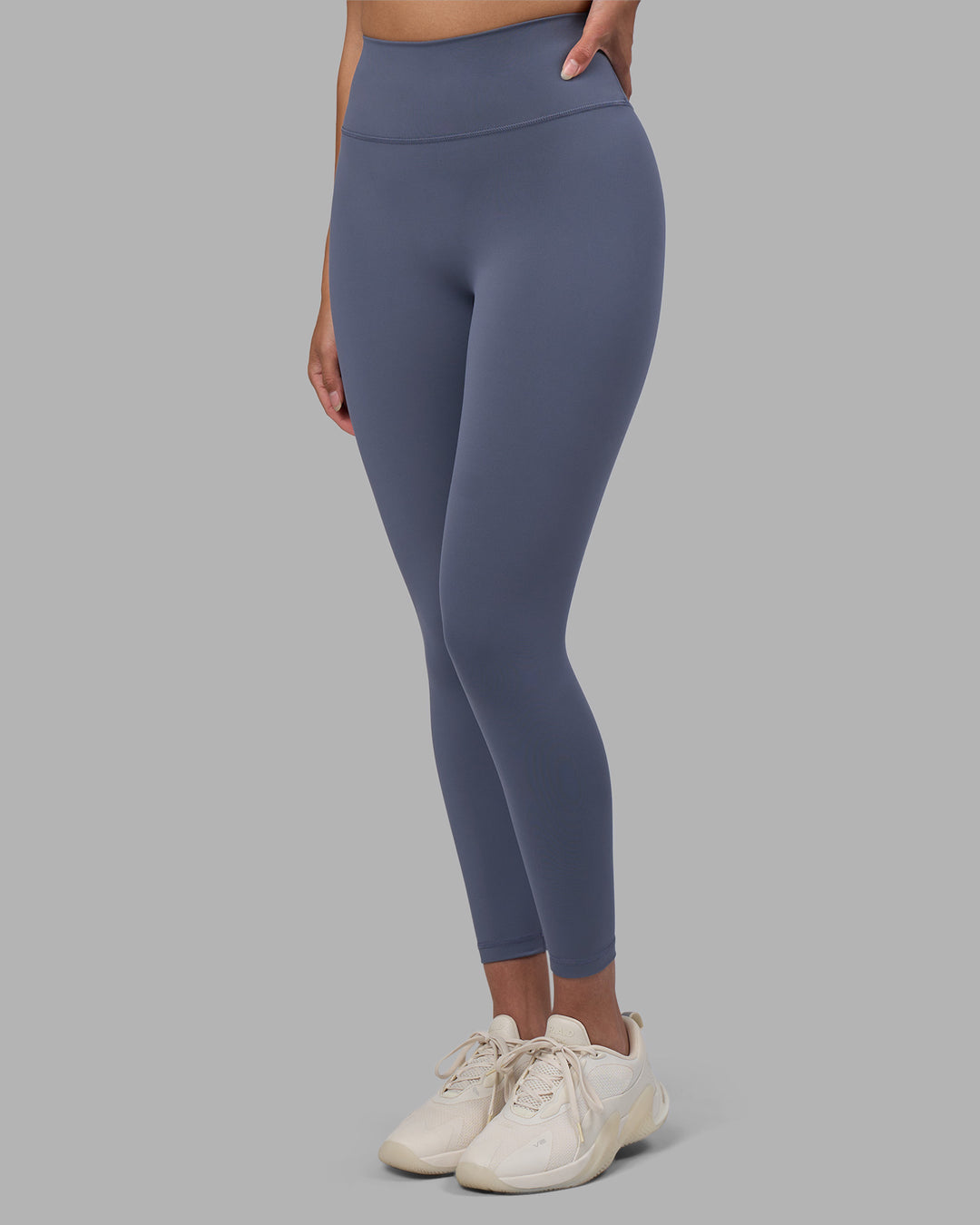 Woman wearing Fusion Ultra High-Rise 7/8 Legging - Night Shadow | Model:Rhiley | Size:S