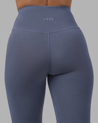 Woman wearing Fusion Ultra High-Rise 7/8 Legging - Night Shadow | Model:Rhiley | Size:S