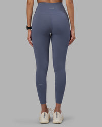 Woman wearing Fusion Ultra High-Rise 7/8 Legging - Night Shadow | Model:Rhiley | Size:S