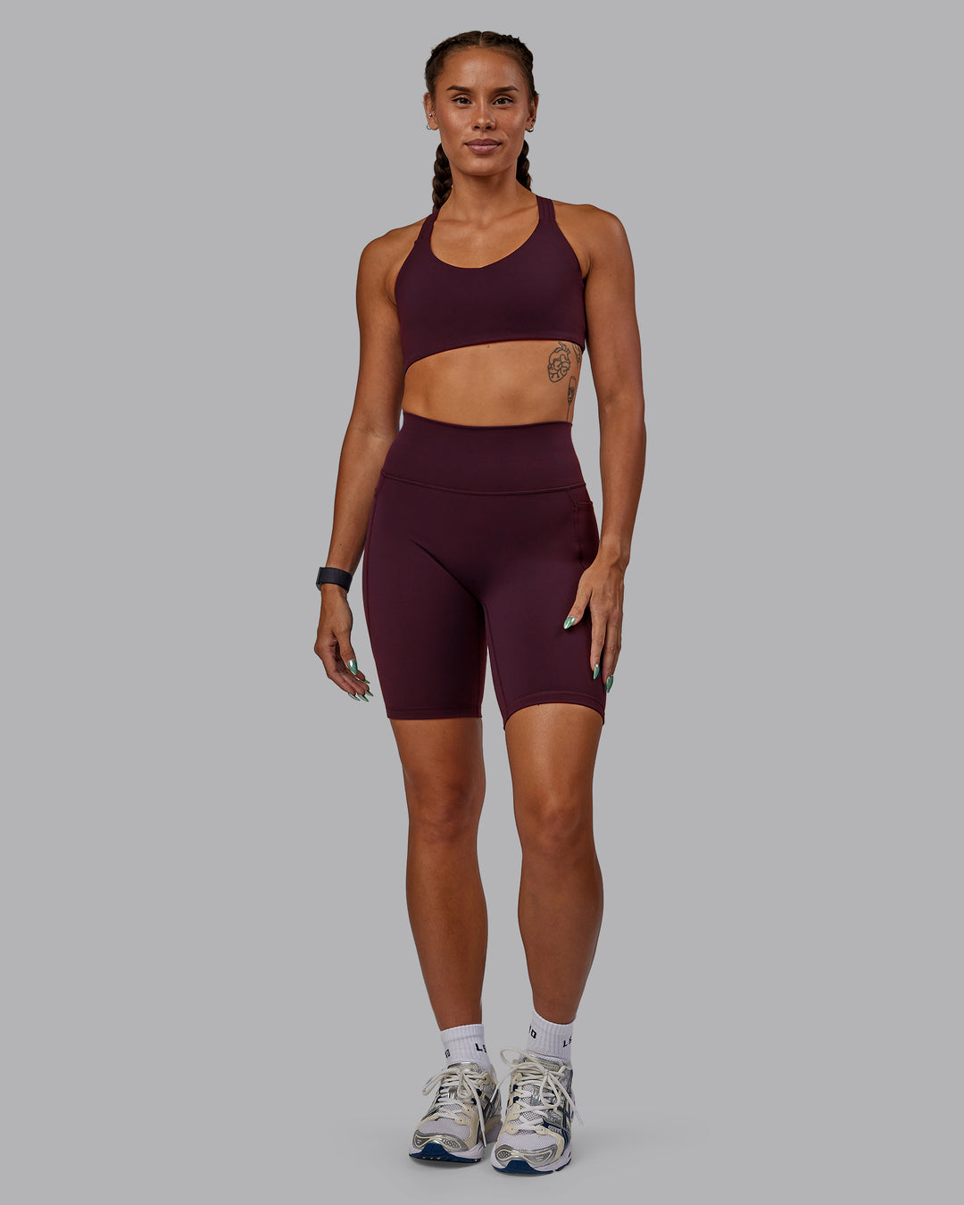 Woman wearing Fusion Ultra High-Rise 9&quot; Short Pockets - Cherry Lacquer | Model:Vanessa | Size:S