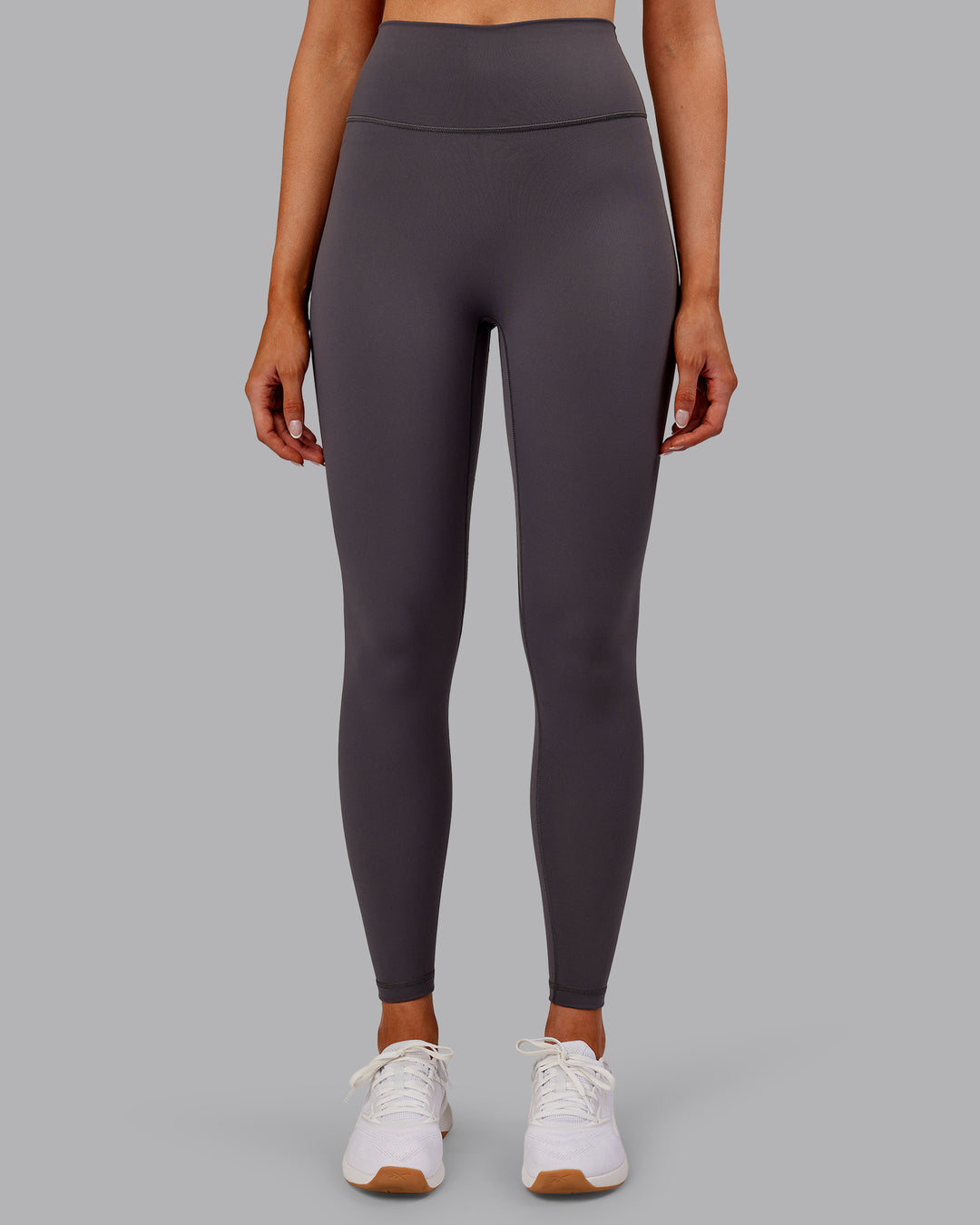 Woman wearing Fusion Ultra High-Rise Full Length Legging - Dark Storm | Model:Ella | Size:S