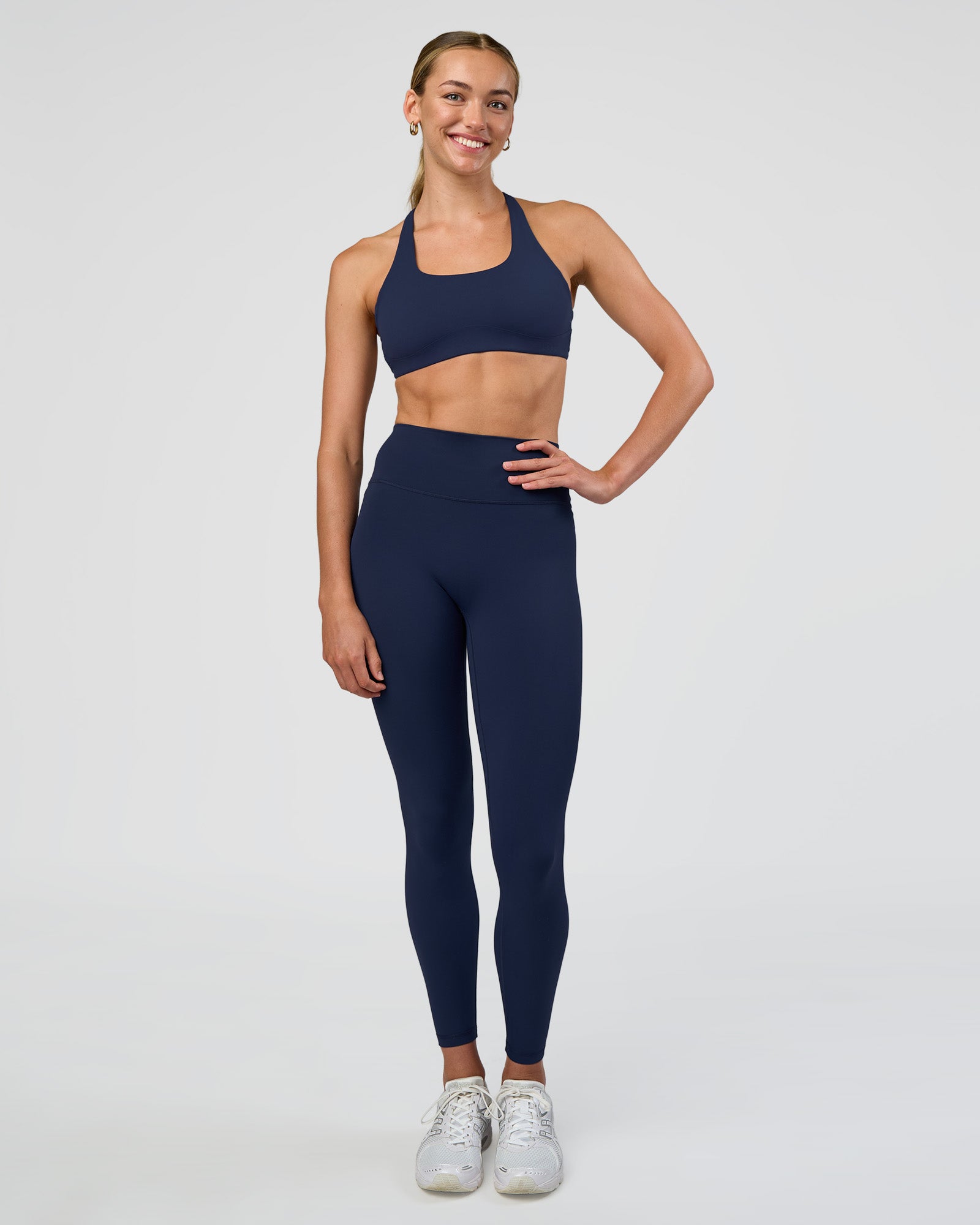 Woman wearing Fusion Ultra High-Rise Full Length Legging - Future Navy | Model:Evie | Size:S