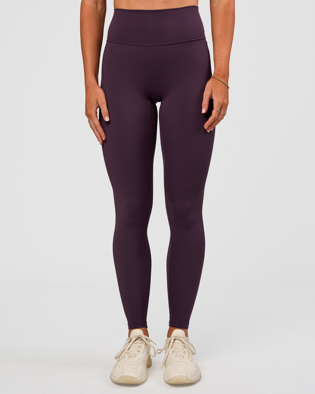 Woman wearing Fusion Ultra High-Rise Full Length Legging - Midnight Plum | Model:Emelia | Size:S