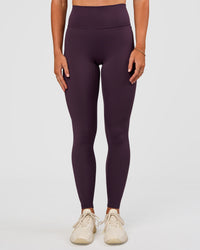 Woman wearing Fusion Ultra High-Rise Full Length Legging - Midnight Plum | Model:Emelia | Size:S
