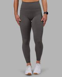 Woman wearing Fusion Ultra High-Rise Full Length Legging Pockets - Dark Storm | Model:Keisha | Size:S