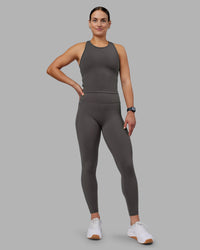 Woman wearing Fusion Ultra High-Rise Full Length Legging Pockets - Dark Storm | Model:Keisha | Size:S