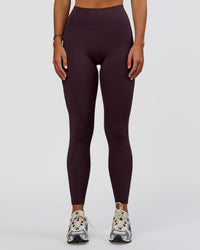 Woman wearing Fusion Ultra High-Rise Full Length Legging Pockets - Midnight Plum | Model:Amity | Size:S