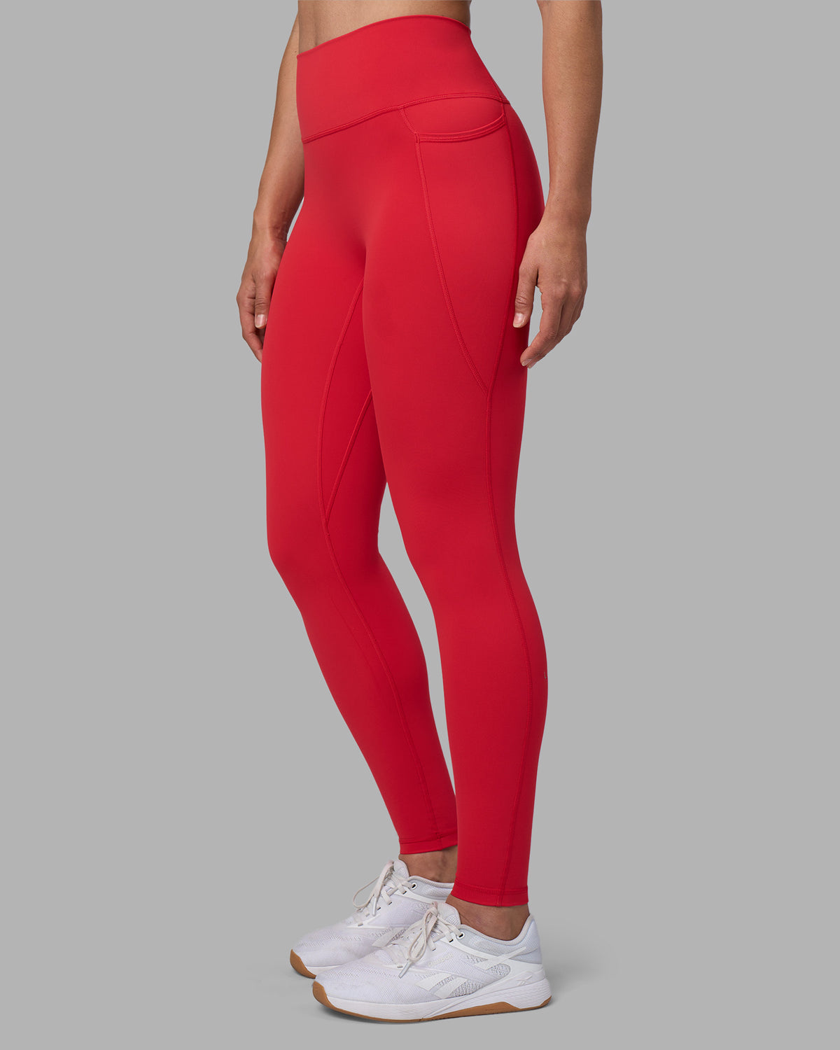 Woman wearing Fusion Ultra High-Rise Full Length Legging Pockets - Scarlet | Model:Sophie | Size:S
