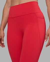 Woman wearing Fusion Ultra High-Rise Full Length Legging Pockets - Scarlet | Model:Sophie | Size:S