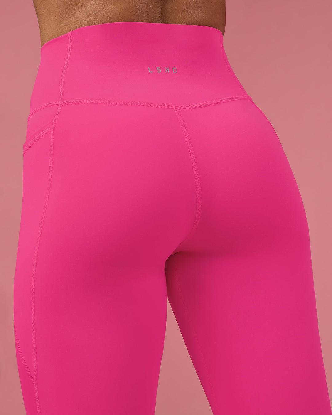 Woman wearing Fusion Ultra High-Rise Full Length Legging Pockets - Ultra Pink | Model:Hannah | Size:S