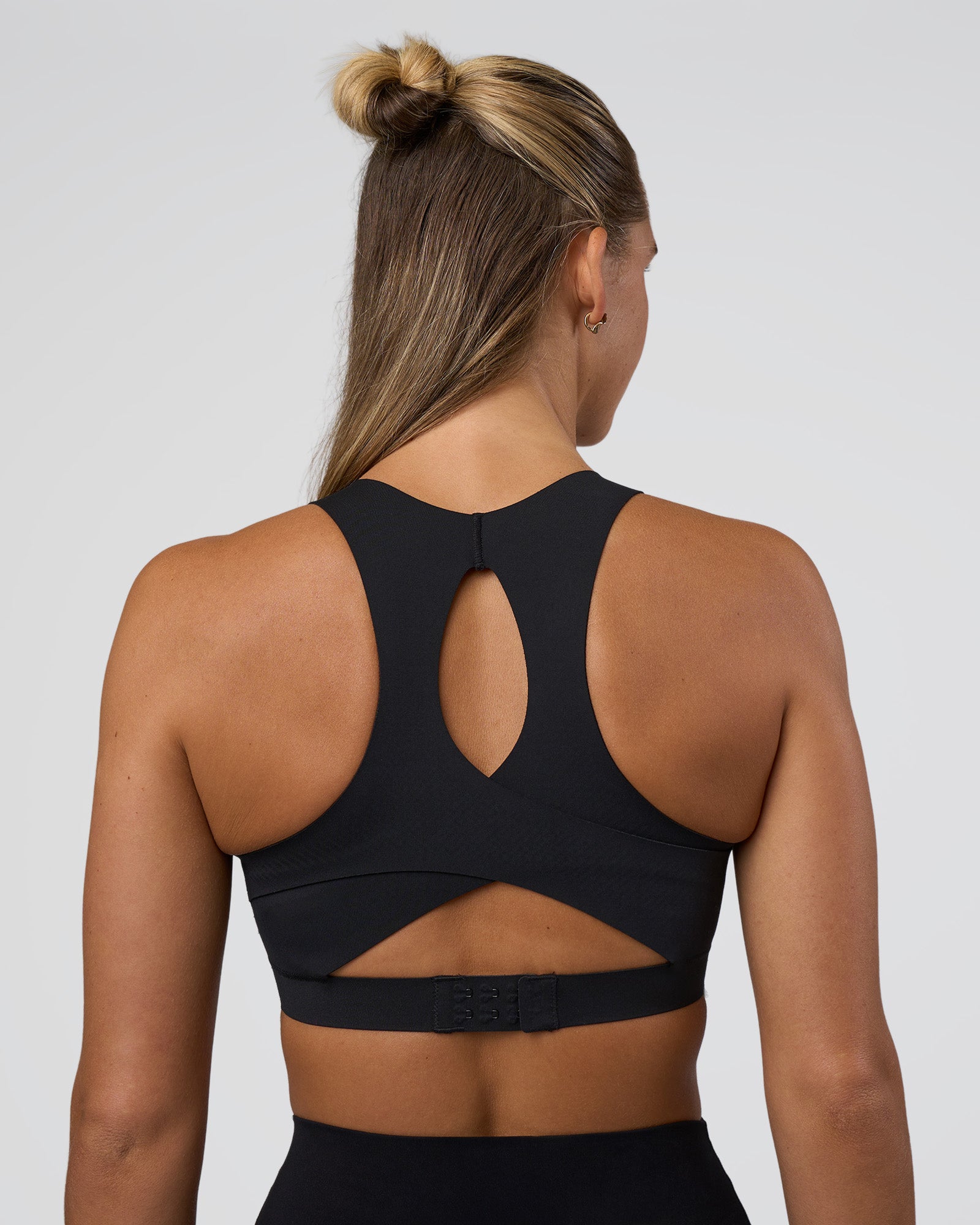 Woman wearing Fusion Sports Bra 2.0 - Black | Model:Amity | Size:S