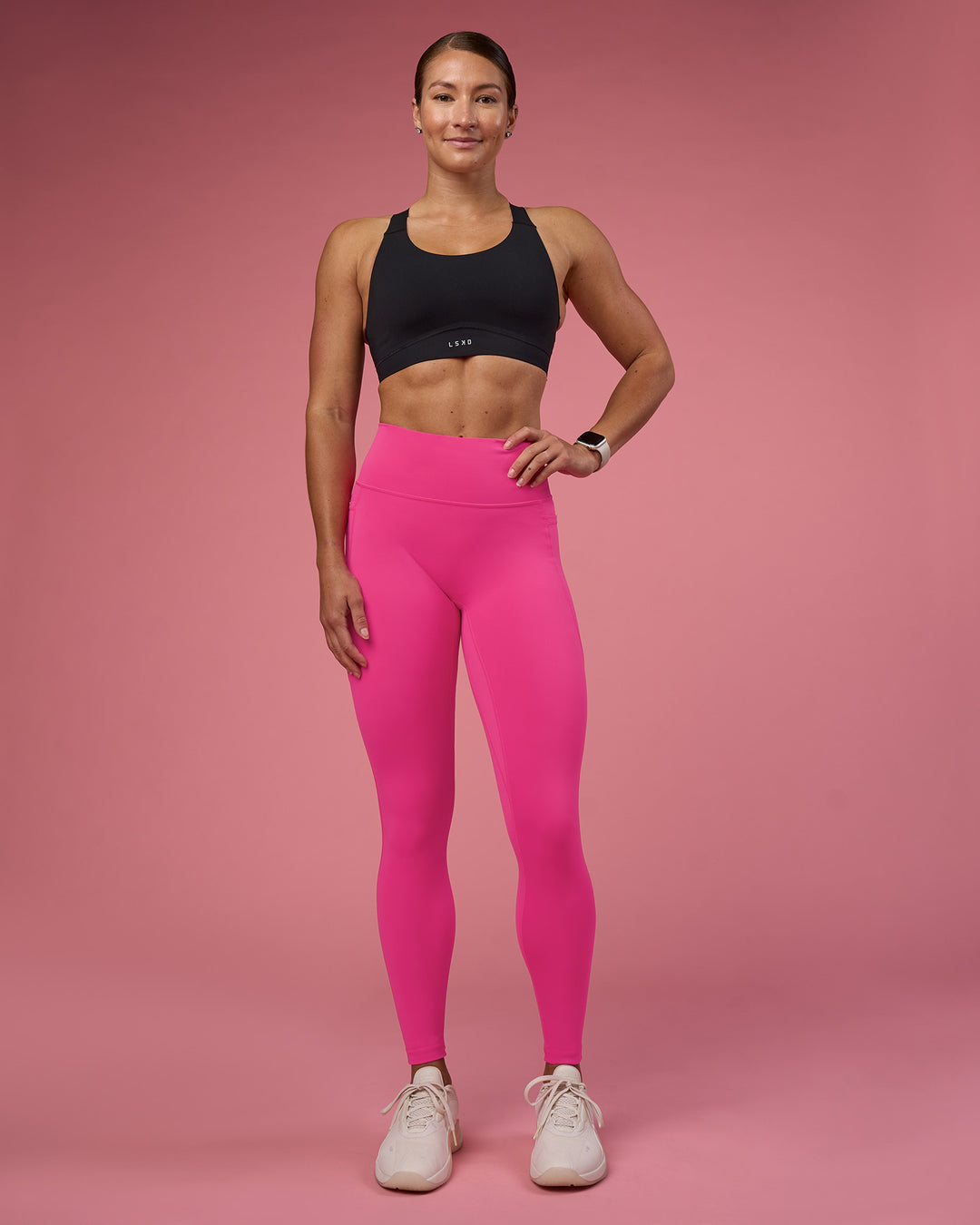 Woman wearing Fusion Ultra High-Rise Full Length Legging Pockets - Ultra Pink | Model:Hannah | Size:S