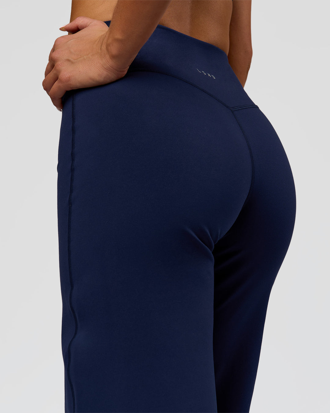 Woman wearing Fusion V-Contour High-Rise Pant - Future Navy | Model:Bianca | Size:S