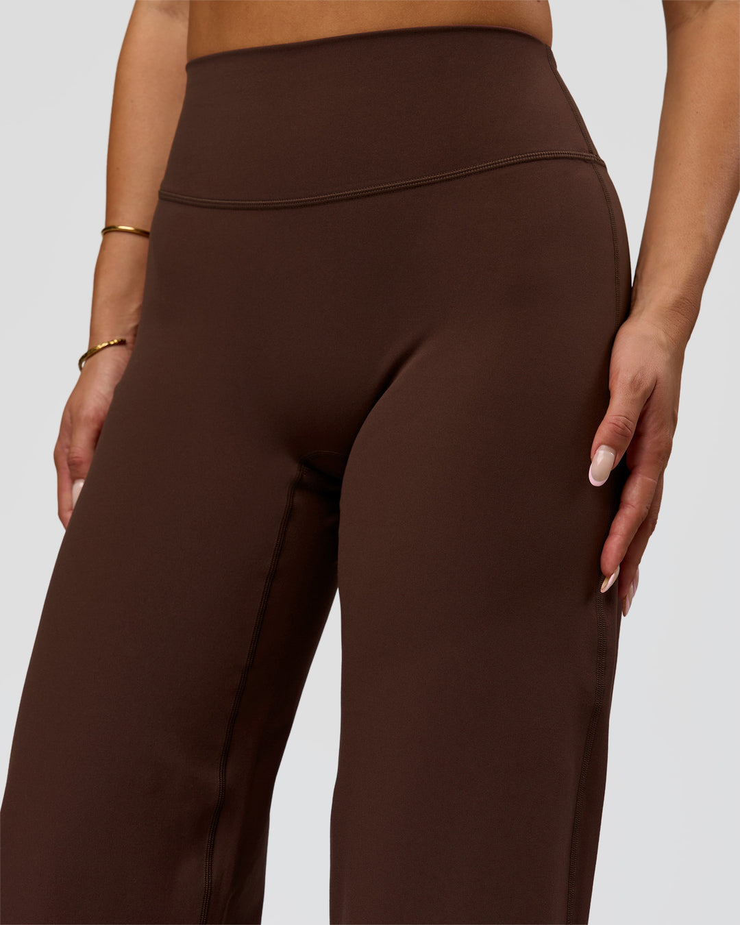 Woman wearing Fusion V-Contour High-Rise Pant - Hot Chocolate | Model:Bianca | Size:S