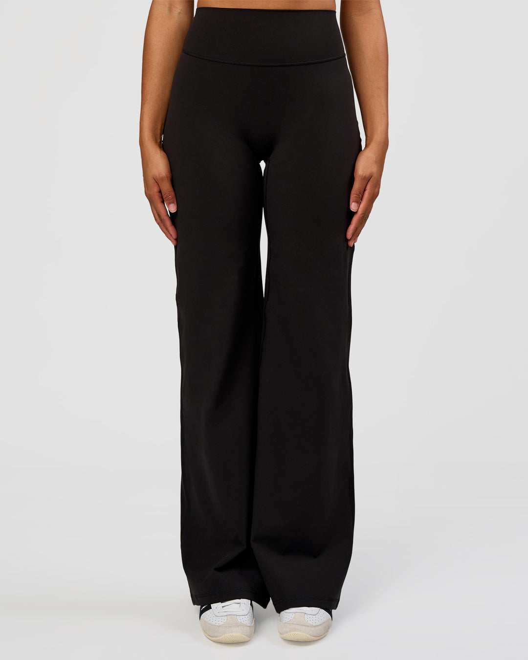Woman wearing Fusion V-Contour High-Rise Tall Pant - Black | Model:Rosie | Size:S