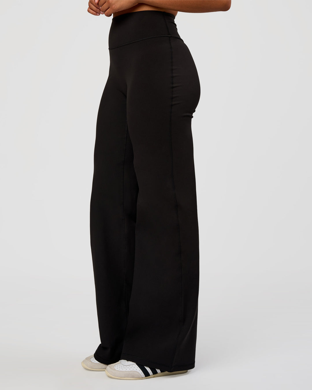 Woman wearing Fusion V-Contour High-Rise Tall Pant - Black | Model:Rosie | Size:S