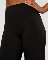 Woman wearing Fusion V-Contour High-Rise Tall Pant - Black | Model:Rosie | Size:S