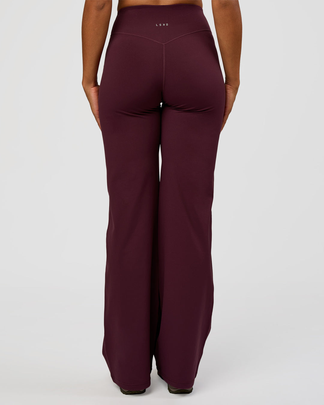 Woman wearing Fusion V-Contour High-Rise Tall Pant - Cherry Lacquer | Model:Rosie | Size:S