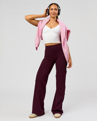 Woman wearing Fusion V-Contour High-Rise Tall Pant - Cherry Lacquer | Model:Claire | Size:S
