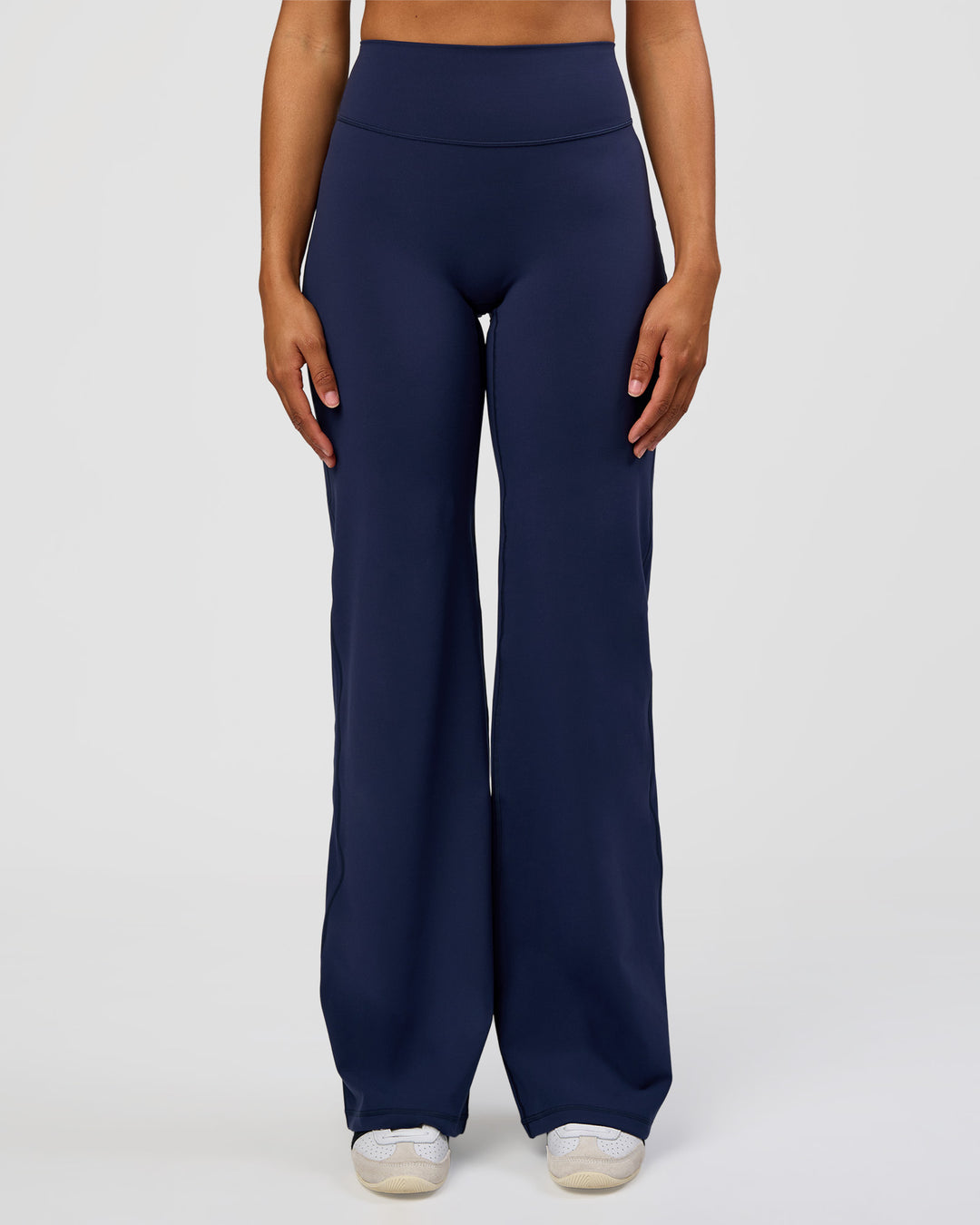 Woman wearing Fusion V-Contour High-Rise Tall Pant - Future Navy | Model:Rosie | Size:S