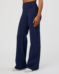 Woman wearing Fusion V-Contour High-Rise Tall Pant - Future Navy | Model:Rosie | Size:S