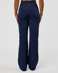 Woman wearing Fusion V-Contour High-Rise Tall Pant - Future Navy | Model:Rosie | Size:S