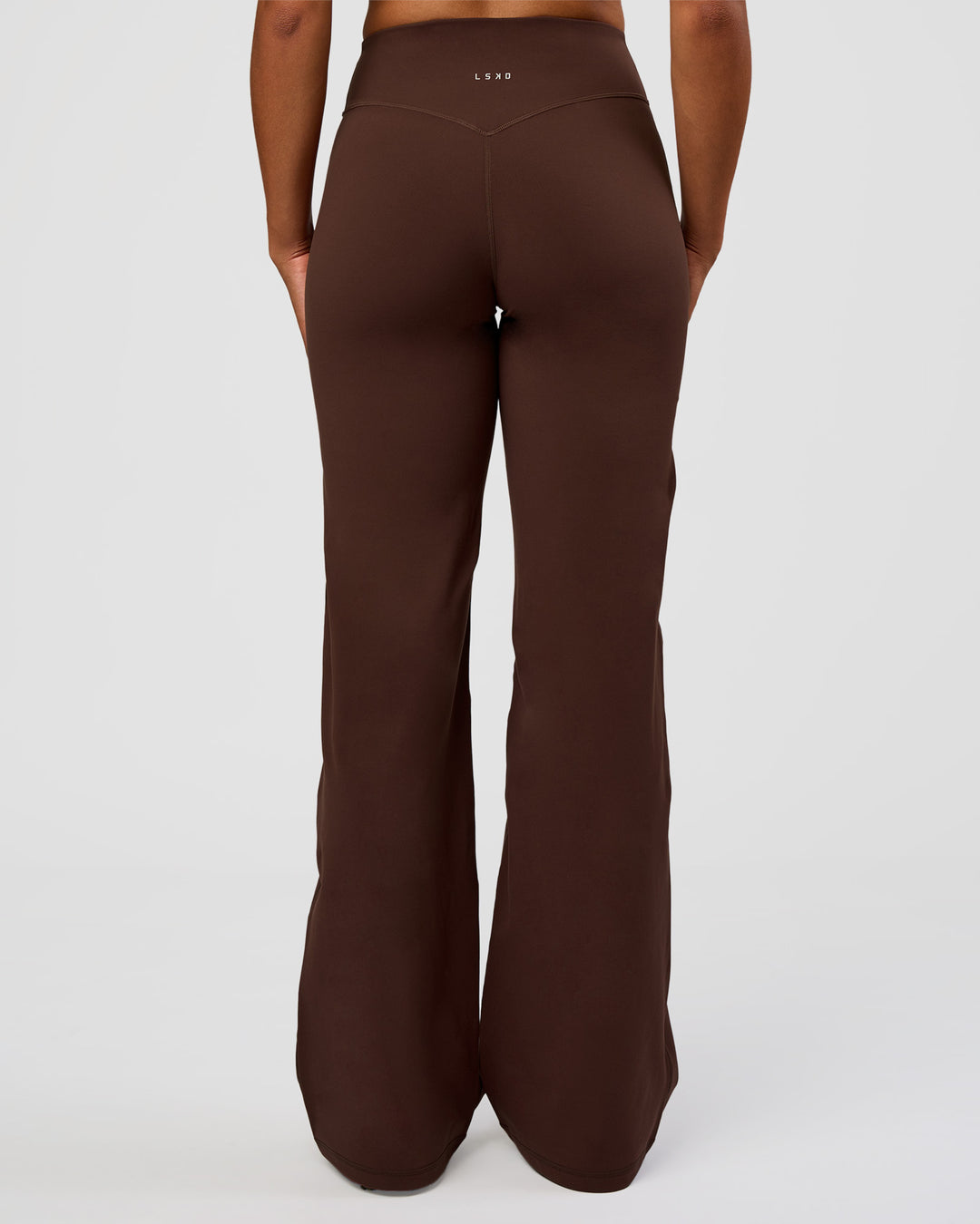 Woman wearing Fusion V-Contour High-Rise Tall Pant - Hot Chocolate | Model:Rosie | Size:S