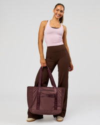 Woman wearing Fusion V-Contour High-Rise Tall Pant - Hot Chocolate | Model:Claire | Size:S