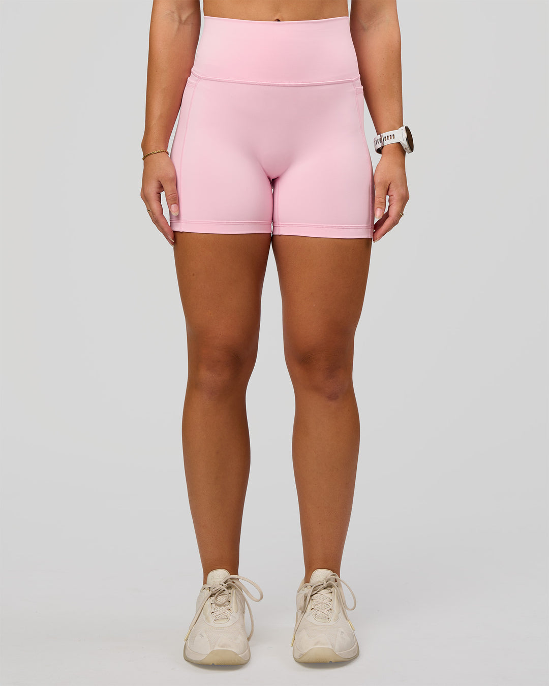 Woman wearing Fusion V-Contour Ultra High-Rise 4” Short Pockets - Marshmallow | Model:Summer | Size:S