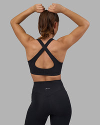 Woman wearing Fusion V-Contour Ultra High-Rise Full Length Legging Pockets - Black | Model:Charlize | Size:S