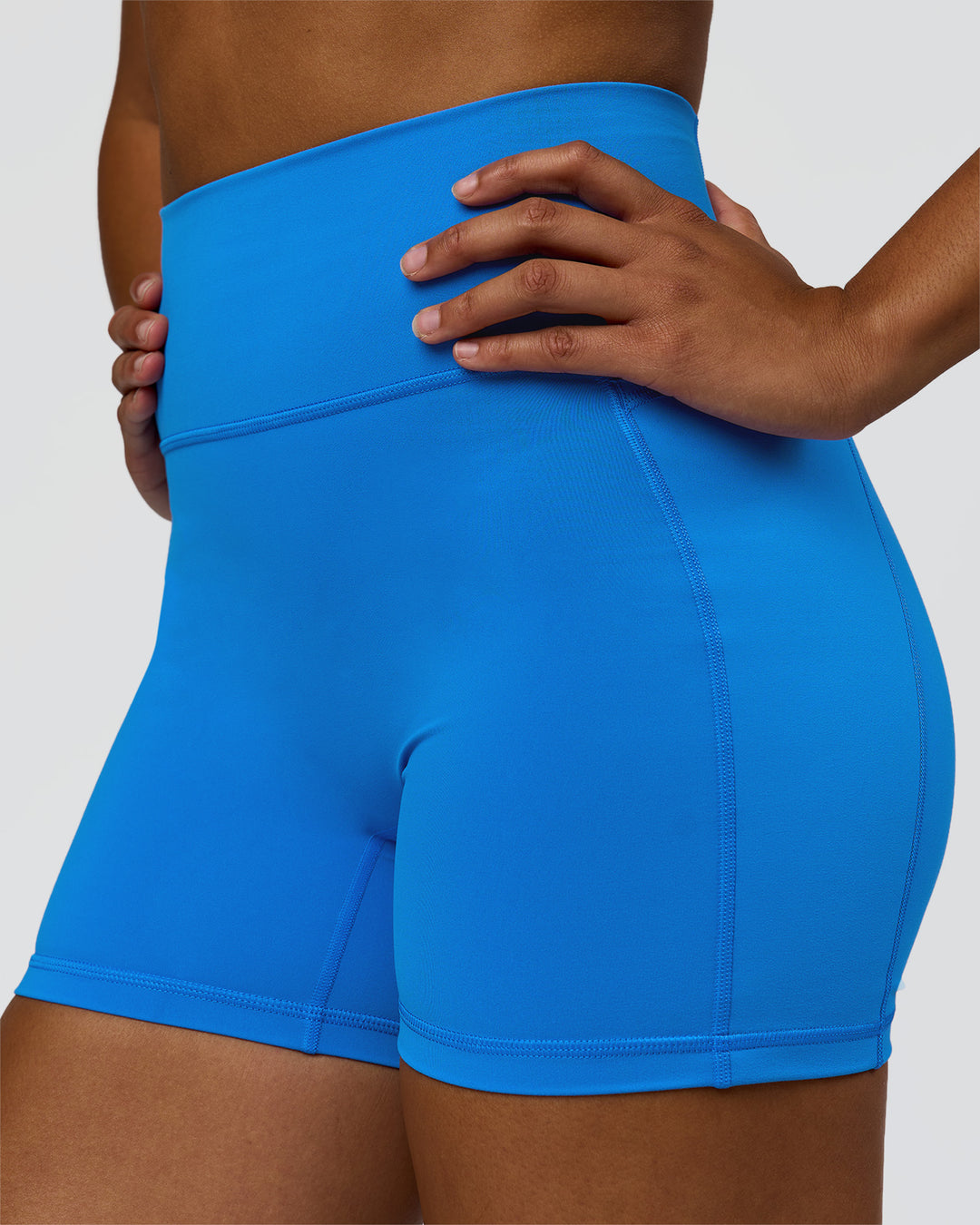 Woman wearing Fusion V-Contour Ultra High-Rise 4" Short Pockets - Palace Blue | Model:Rosie | Size:S - view 9