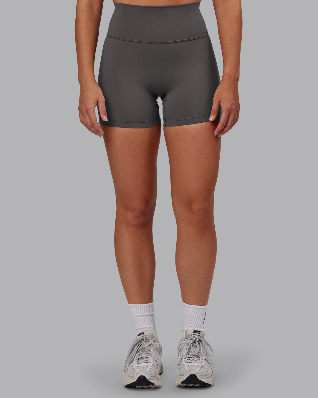 Woman wearing Fusion Ultra High-Rise 4" Short - Dark Storm | Model:Hannah | Size:S