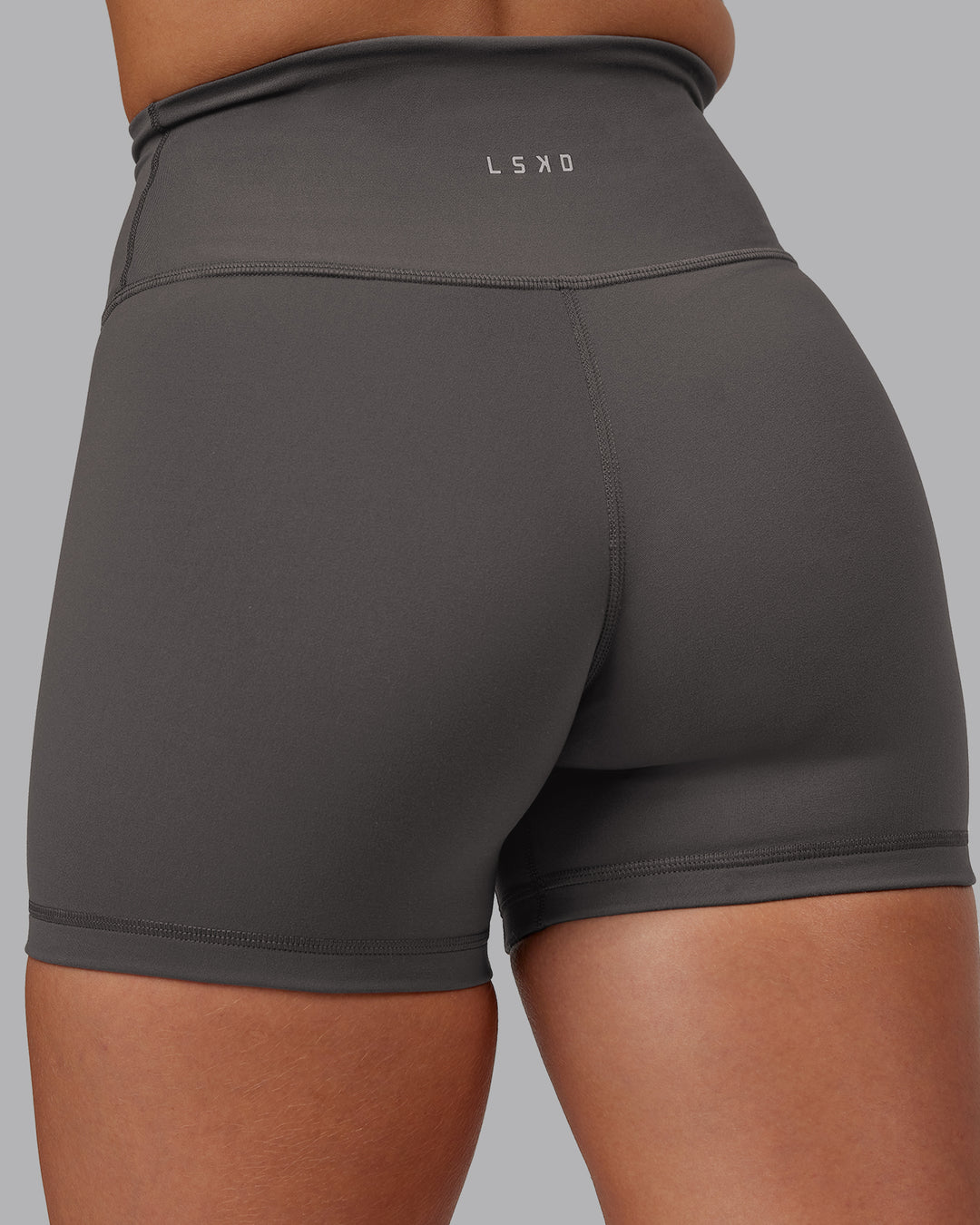 Woman wearing Fusion Ultra High-Rise 4&quot; Short - Dark Storm | Model:Hannah | Size:S
