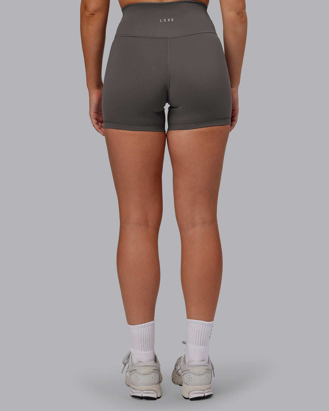 Woman wearing Fusion Ultra High-Rise 4&quot; Short - Dark Storm | Model:Hannah | Size:S