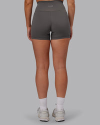 Woman wearing Fusion Ultra High-Rise 4" Short - Dark Storm | Model:Hannah | Size:S
