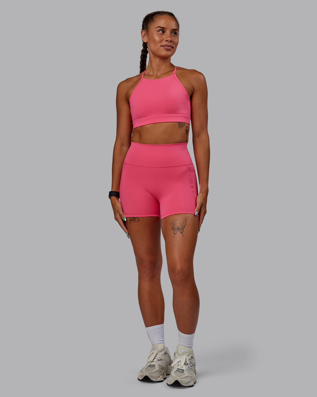 Woman wearing Fusion Ultra High-Rise 4&quot; Short Pockets - Hot Pink | Model:Vanessa | Size:S