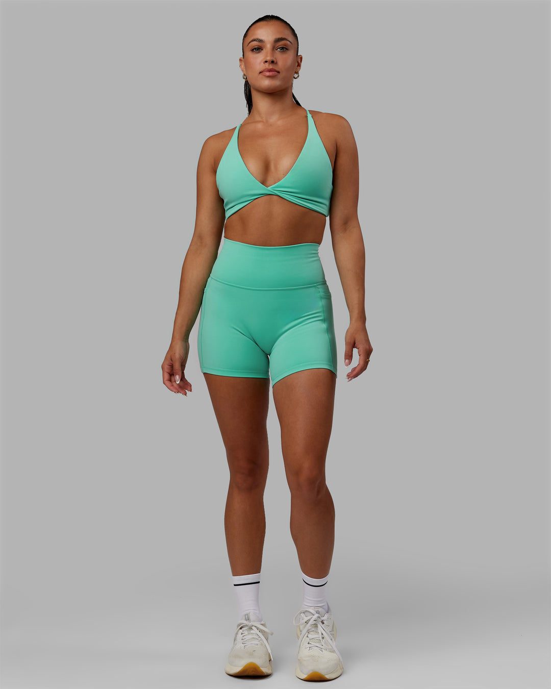 Woman wearing Fusion X-Short Tights - Aquatic Awe