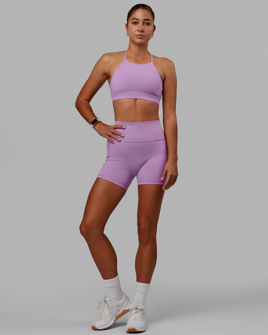 Woman wearing Fusion Ultra High-Rise 4&quot; Short Pockets - Light Violet | Model:Asia | Size:S
