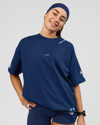 Woman wearing GG Heavyweight Oversized Tee - Future Navy | Model:Grace | Size:S