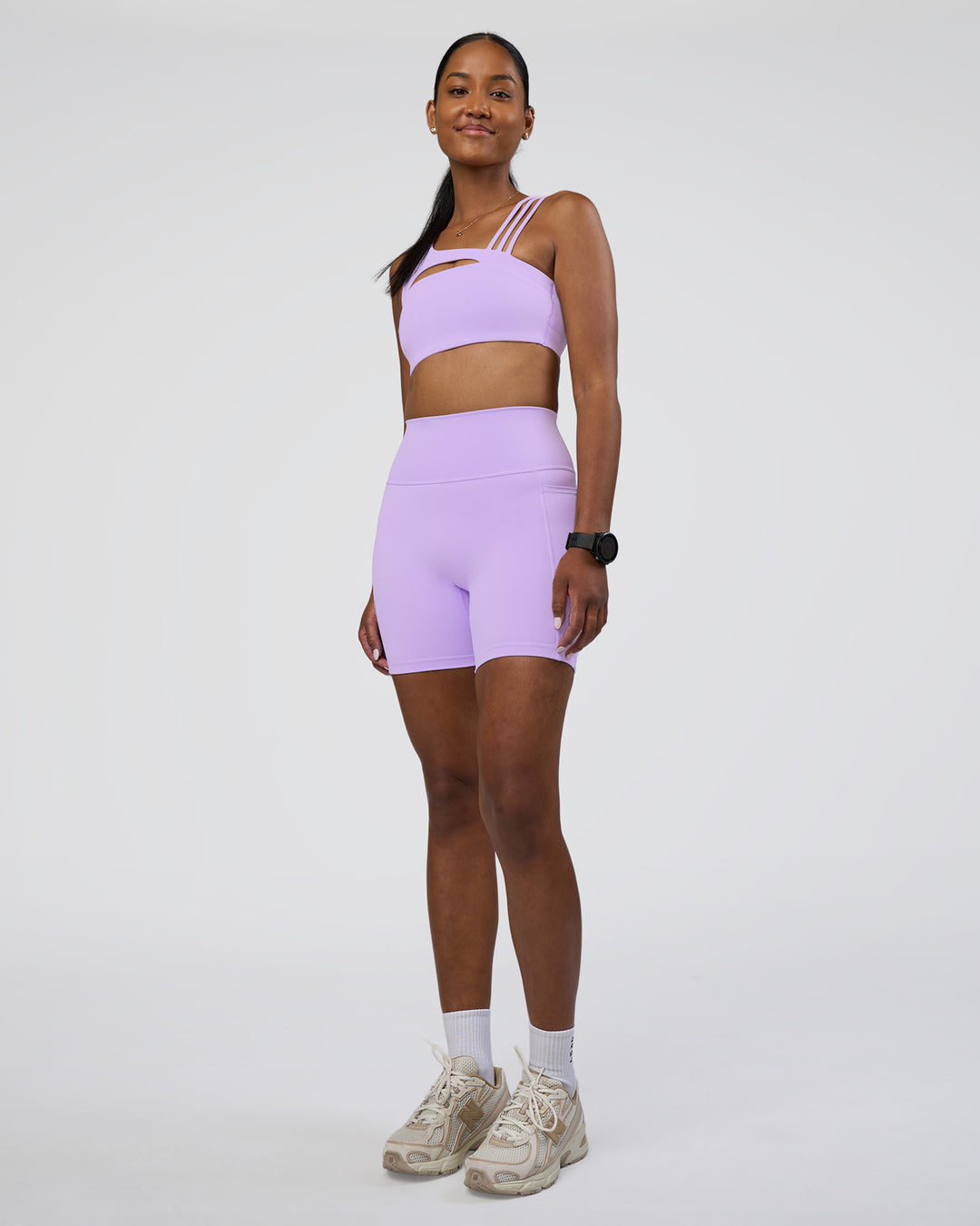 Woman wearing Galvanise Splice Sports Bra - Pale Lilac | Model:Rica | Size:S
